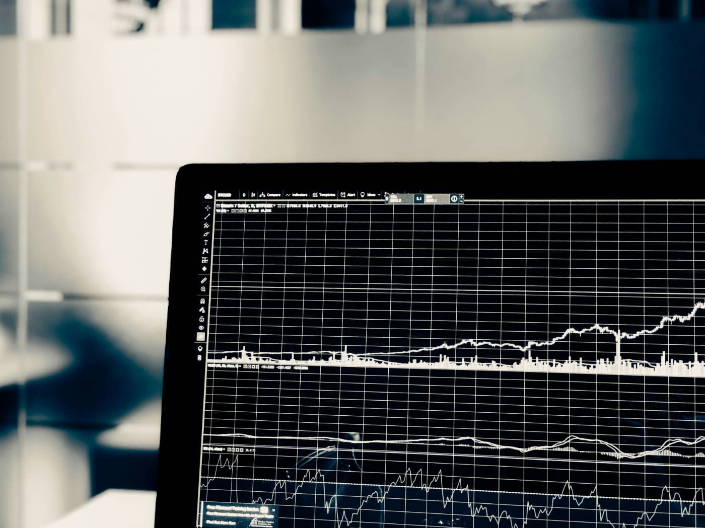 Black and white data displayed on a laptop screen.